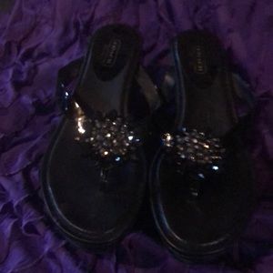 Coach 2 inch heel sandals with embellishments.